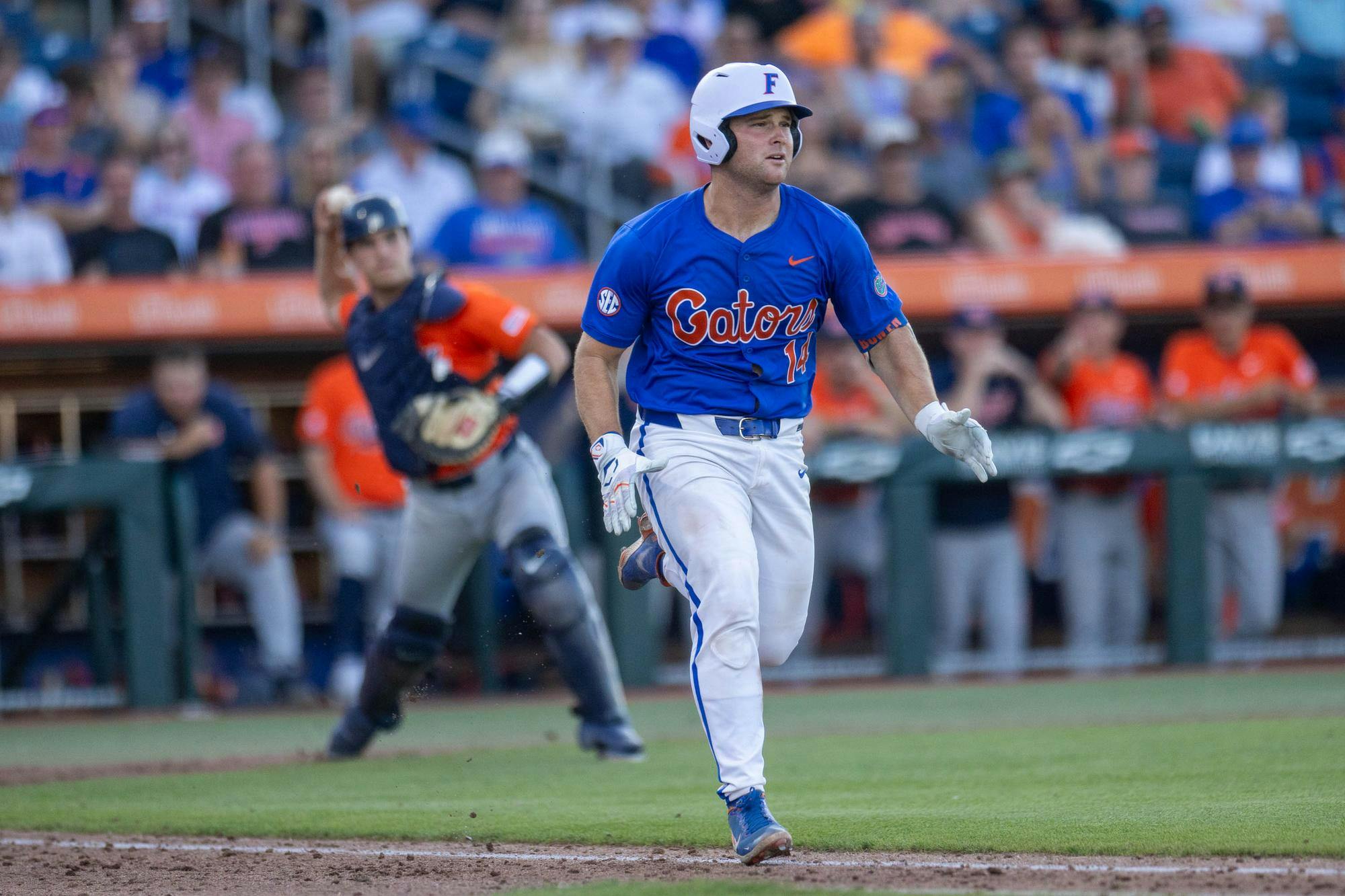 Florida catcher Karson Bowen (14) runs to first base in an attempt to beat the catcher during an NCAA college baseball game against Auburn at Condron Family Ballpark in Gainesville, Fla., Friday, April 17, 2026.