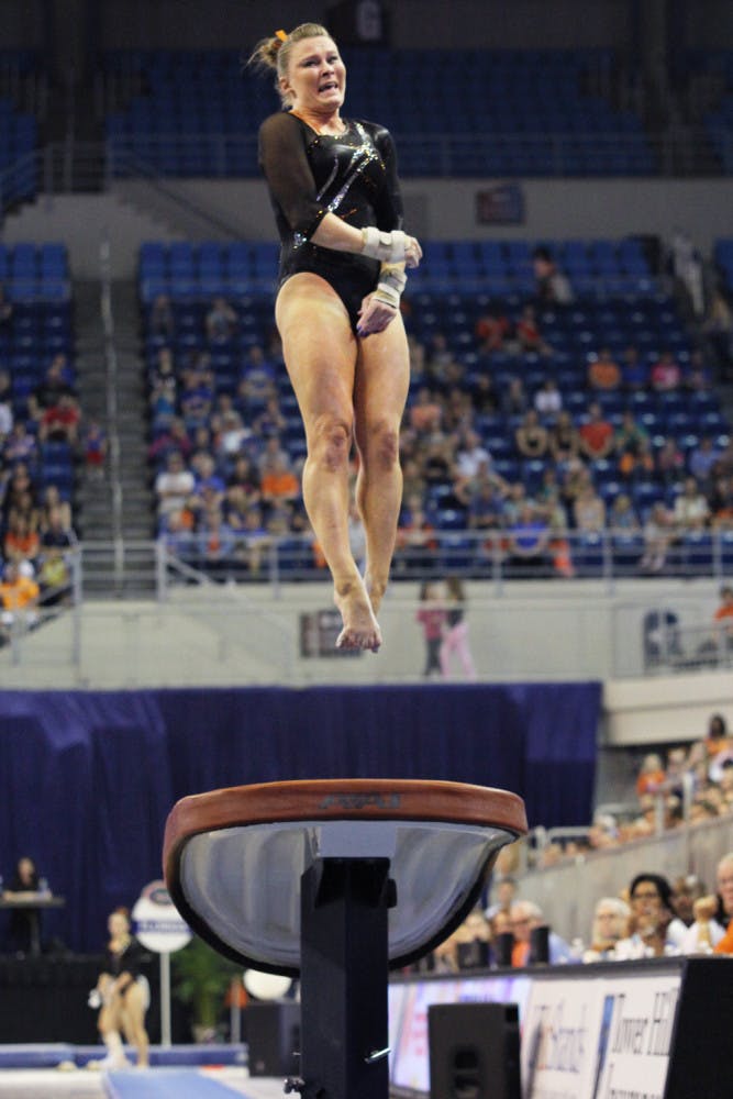 Bridget Sloan performs on vault in UF’s 196.975-196.075 win against UK on Feb. 22. Sloan and Kytra Hunter were the only Gators to stick their landings in vault at the SEC Championships on March 23.