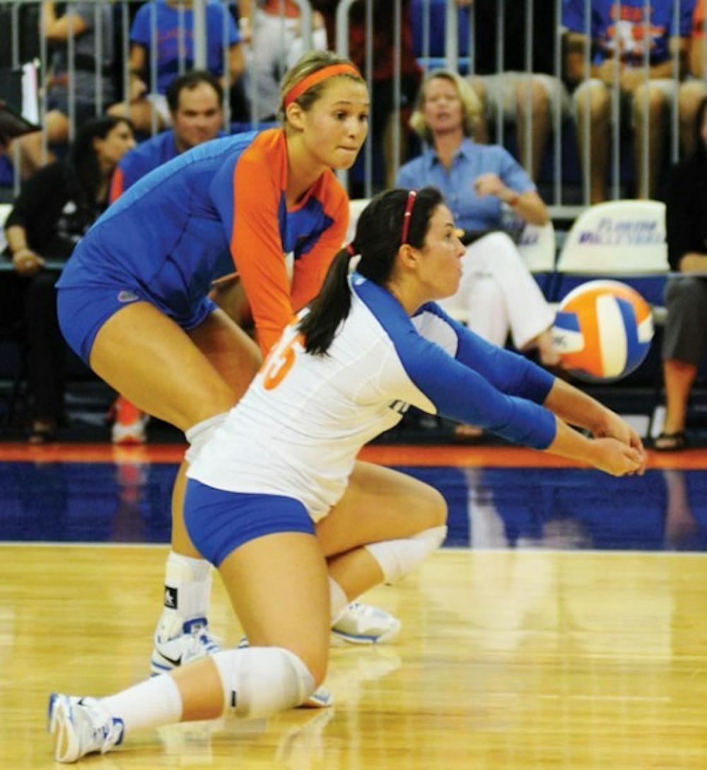 <p>Redshirt freshman libero Taylor Unroe (right) recorded 42 digs during the weekend at the Nike Big Four Classic in Palo Alto, Calif.</p>