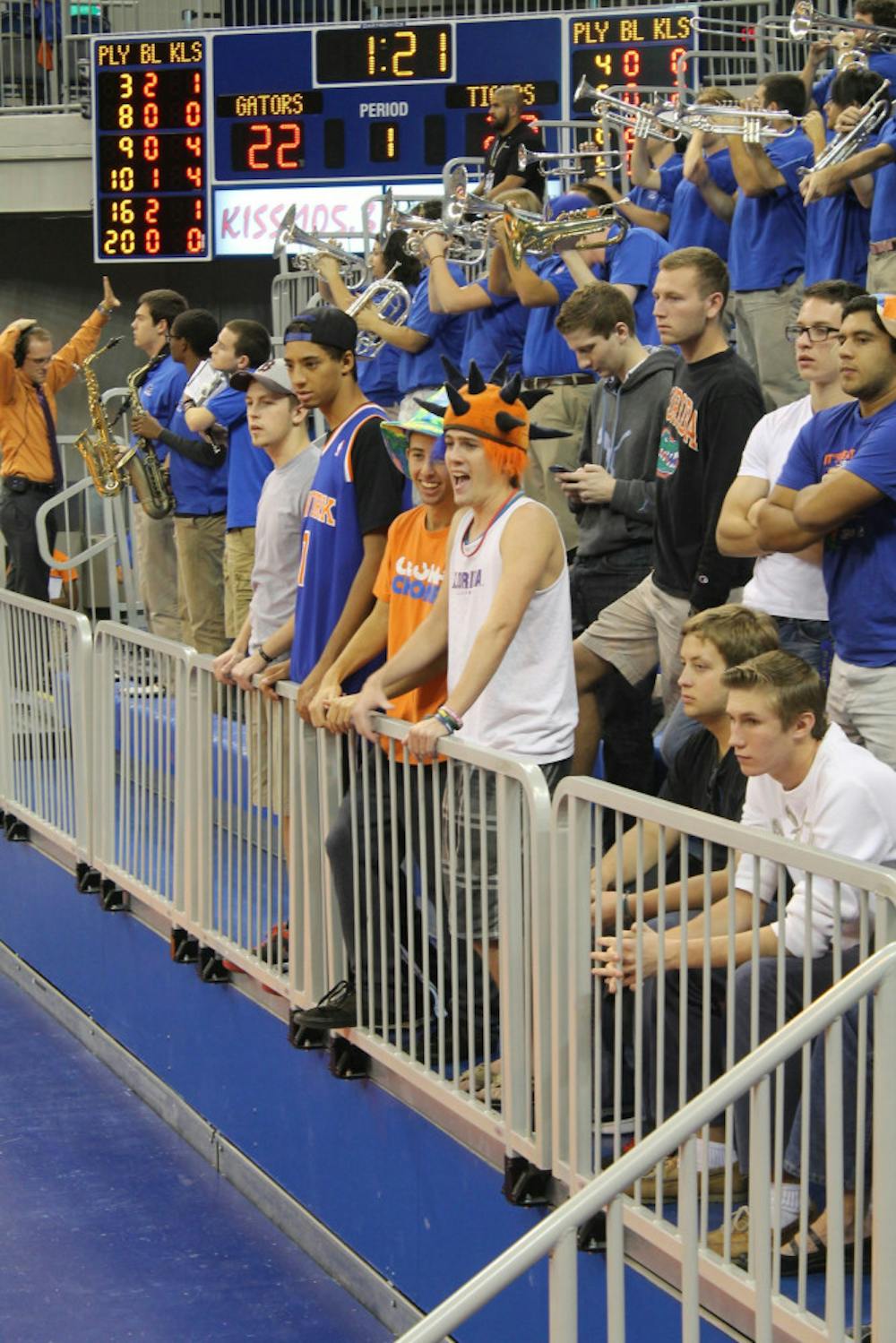 <p>Members of "Tolbert 5" watch the Florida women's volleyball team during a home match this year in the O'Connell Center.</p>