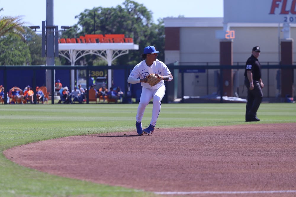 Shortstop Josh Rivera delivers a throw to first base. The Gators downed rival Florida State, 6-3 Tuesday night.