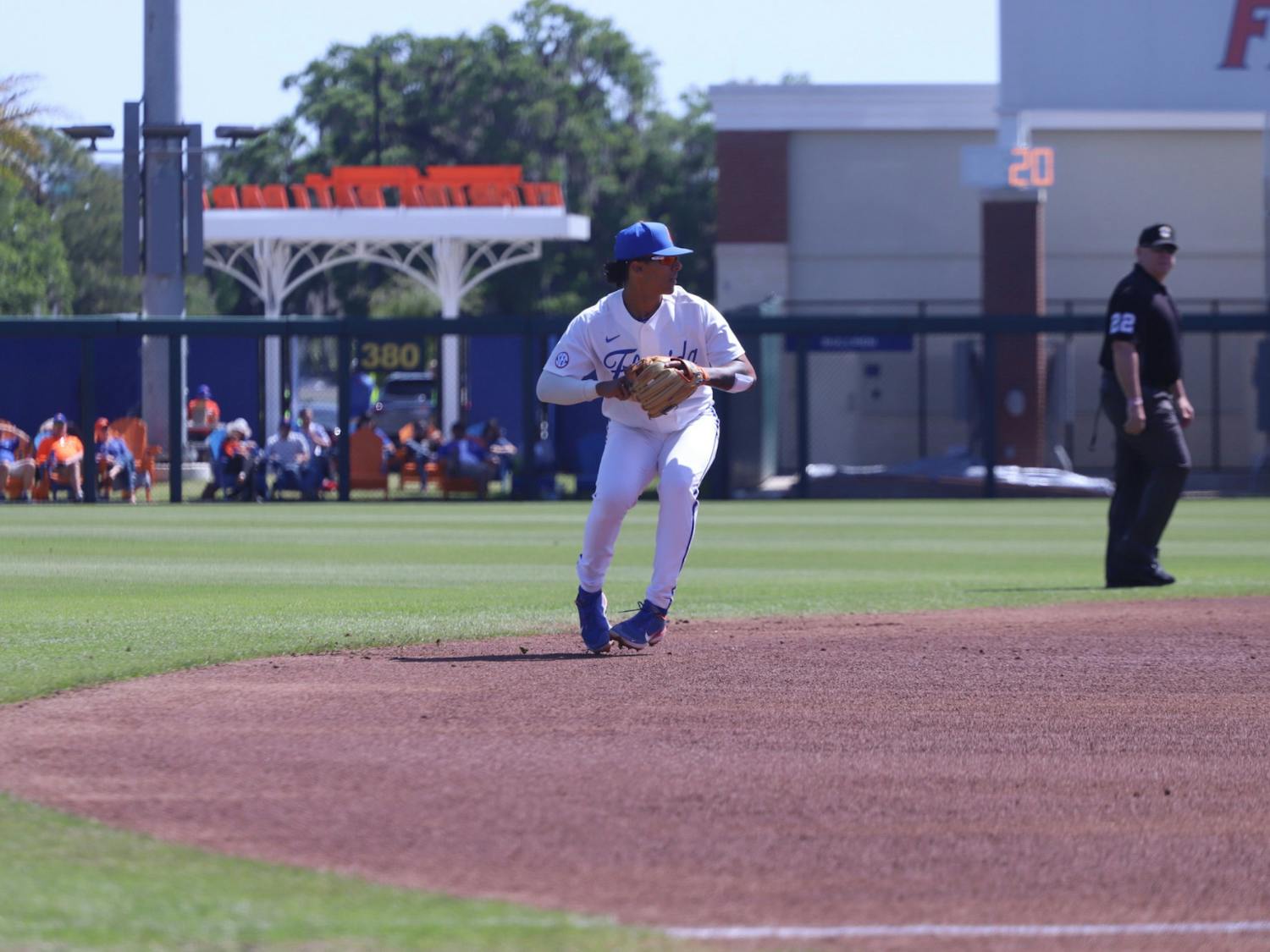 Shortstop Josh Rivera delivers a throw to first base. The Gators downed rival Florida State, 6-3 Tuesday night.