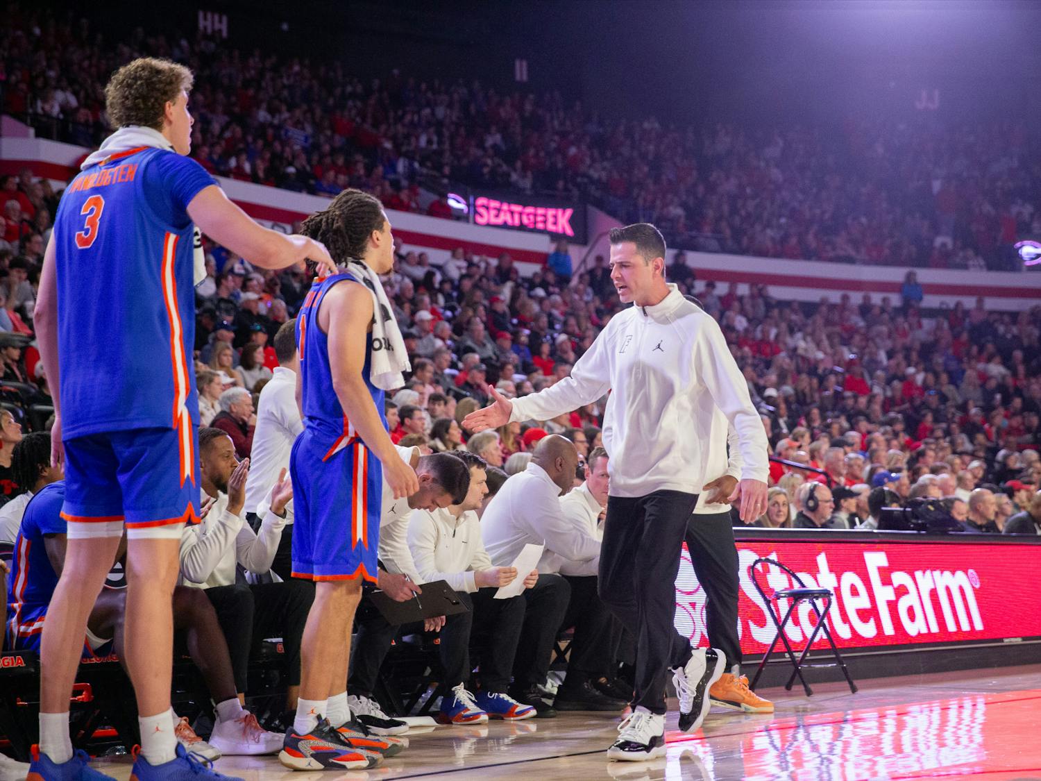 Florida men's basketball head coach Todd Golden shows emotion on the bench during the team's game at the University of Georgia on Saturday, February 17, 2024. 