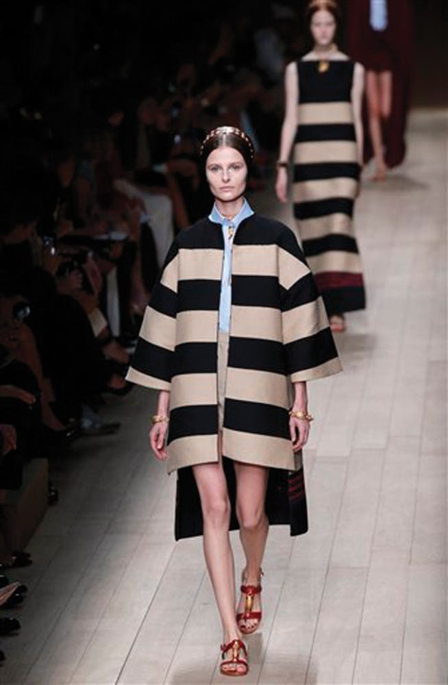 A model presents a creation as part of Valentino's ready-to-wear Spring/Summer 2014 fashion collection, presented Tuesday, Oct. 1, 2013 in Paris.