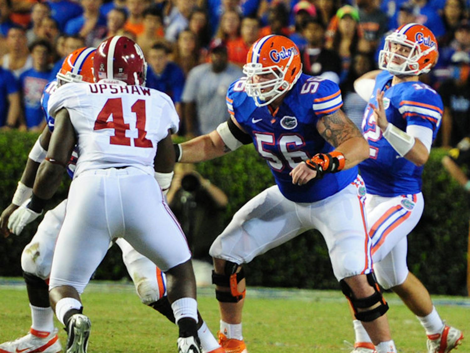 Florida senior offensive lineman Dan Wenger (56) will not play Saturday against Furman after suffering an injury to his ankle during last week’s loss.