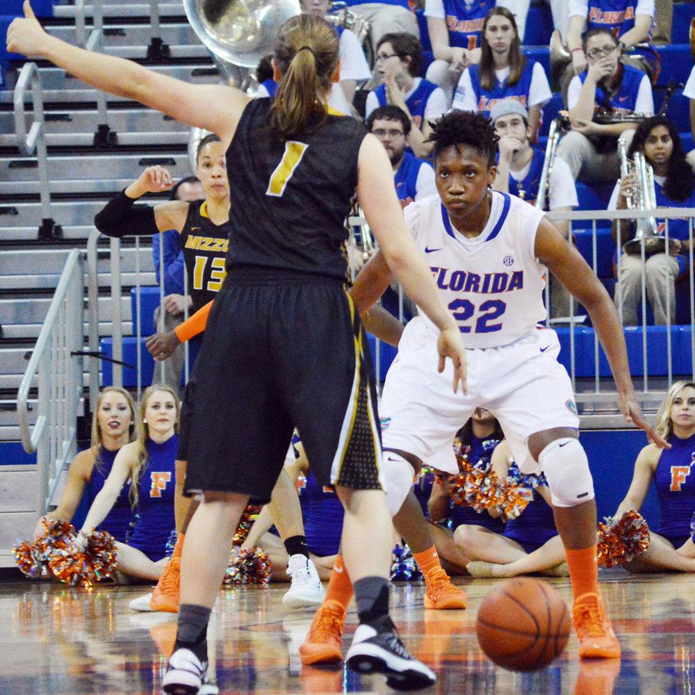 <p>Kayla Lewis (22) guards Missouri's Lianna Doty during the Gators' 81-76 loss to the Tigers on Feb. 20.</p>