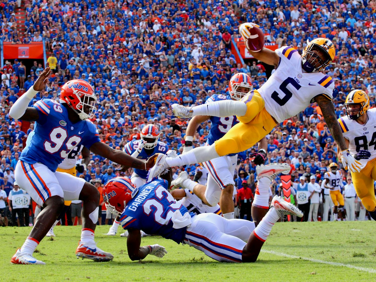 Chauncey Gardner, Jr. tackles LSU running back Derrius Guice during Florida's 17-16 loss against the Tigers on Saturday at Ben Hill Griffin Stadium.