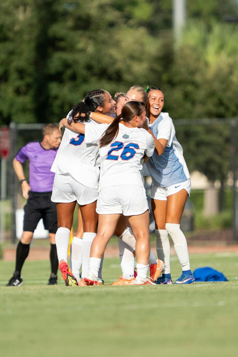 Florida Gator's celebrate together after lead-taking goal scored by forward Zoe Main at Donald R. Dizney Stadium in Gainesville, Fla. Thursday, Aug 27th.