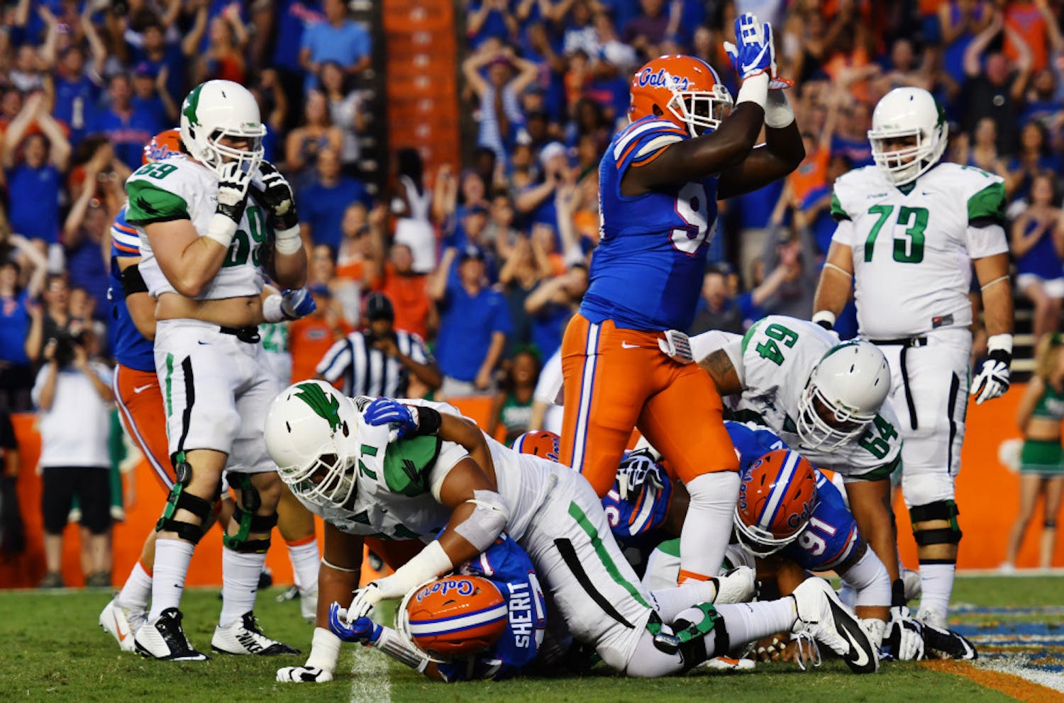 Bryan Cox signals for a safety during Florida's 32-0 win over North Texas on Sept. 17, 2016, at Ben Hill Griffin Stadium.