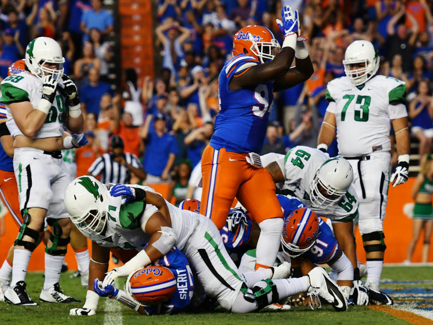 Bryan Cox signals for a safety during Florida's 32-0 win over North Texas on Sept. 17, 2016, at Ben Hill Griffin Stadium.