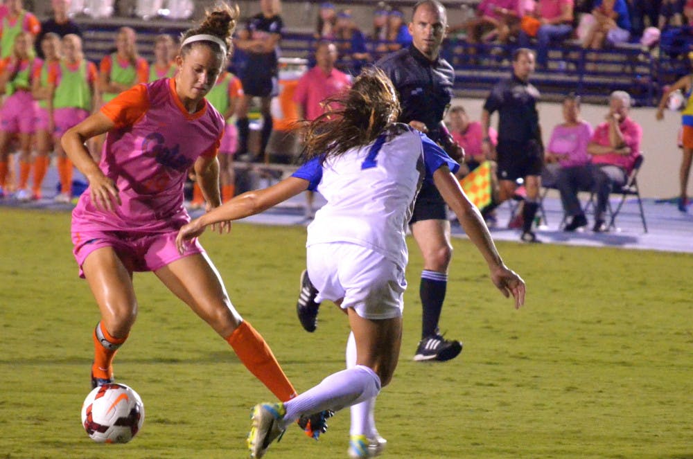 <p>Florida junior midfielder Havana Solaun fakes out a Kentucky defender during the Gators' 3-0 win against the Wildcats on Oct. 18 2013 at James G. Pressly Stadium.</p>