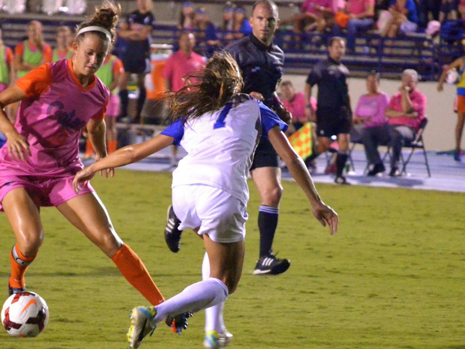 Florida junior midfielder Havana Solaun fakes out a Kentucky defender during the Gators' 3-0 win against the Wildcats on Oct. 18 2013 at James G. Pressly Stadium.