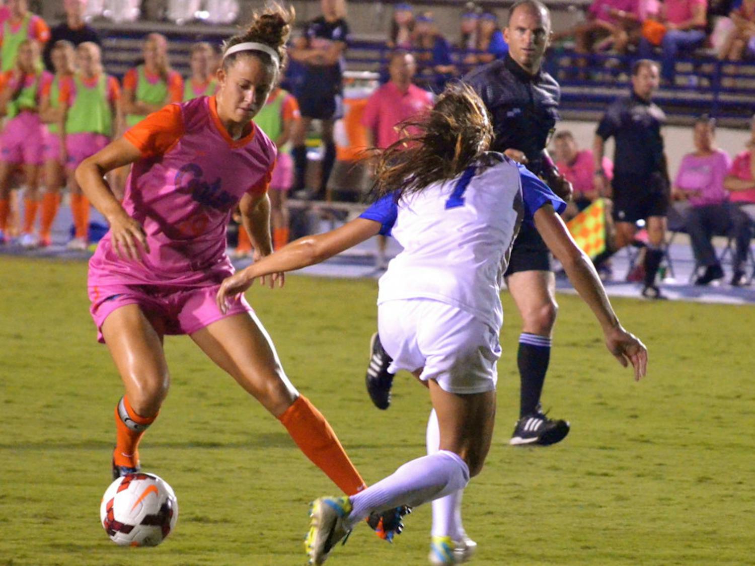 Florida junior midfielder Havana Solaun fakes out a Kentucky defender during the Gators' 3-0 win against the Wildcats on Oct. 18 2013 at James G. Pressly Stadium.
