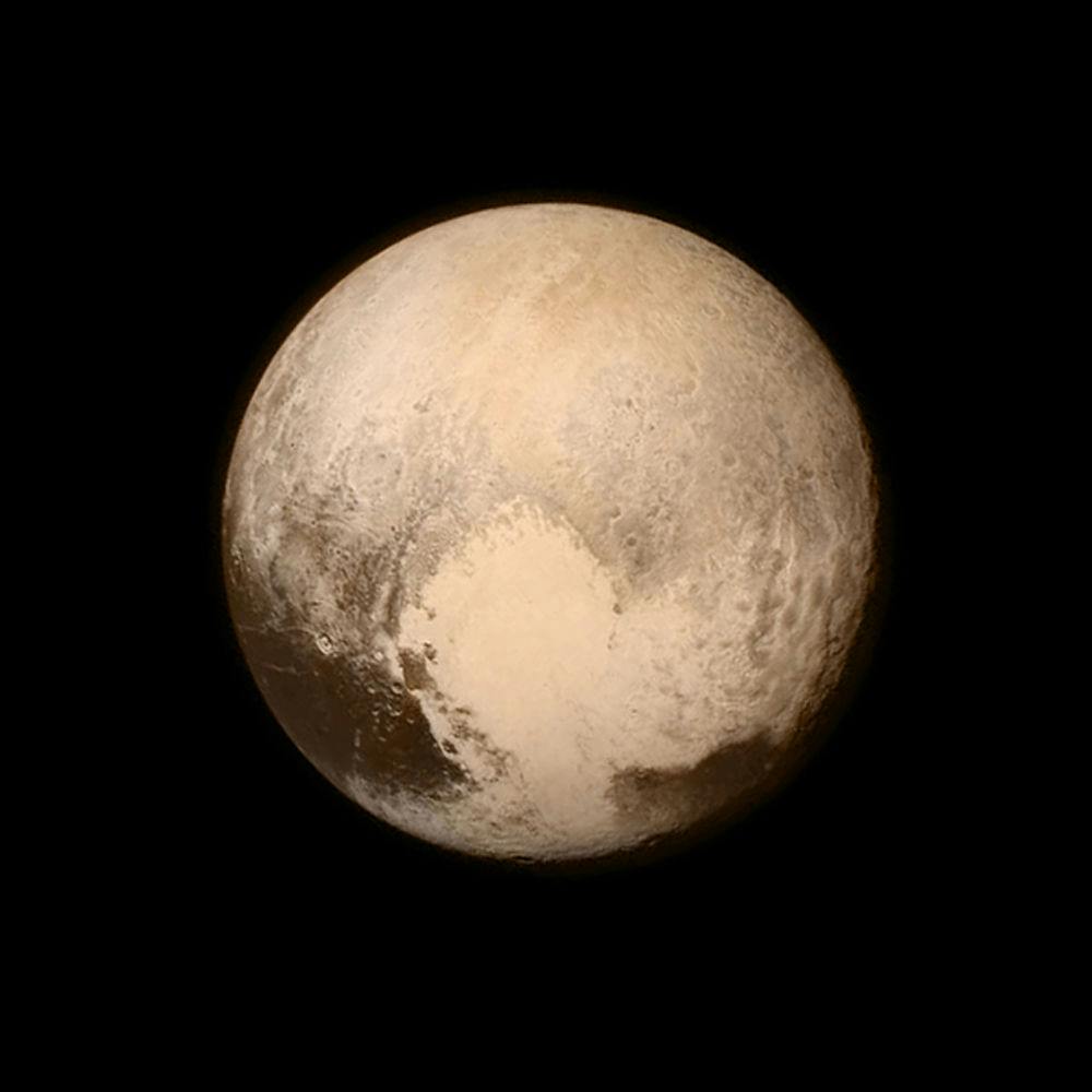 This July 13 image provided by NASA shows Pluto as seen from the New Horizons spacecraft. The United States is now the only nation to visit every single planet in the solar system. Pluto was No. 9 in the lineup when New Horizons departed Cape Canaveral, Florida, on Jan. 19, 2006.
