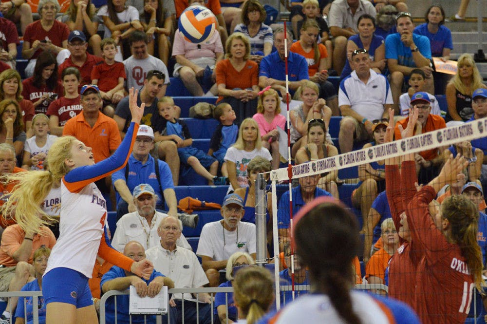 <p>Freshman outside hitter Carli Snyder hits the ball over the net during Florida's 3-2 win against Oklahoma on Aug. 30 in the O'Connell Center.</p>