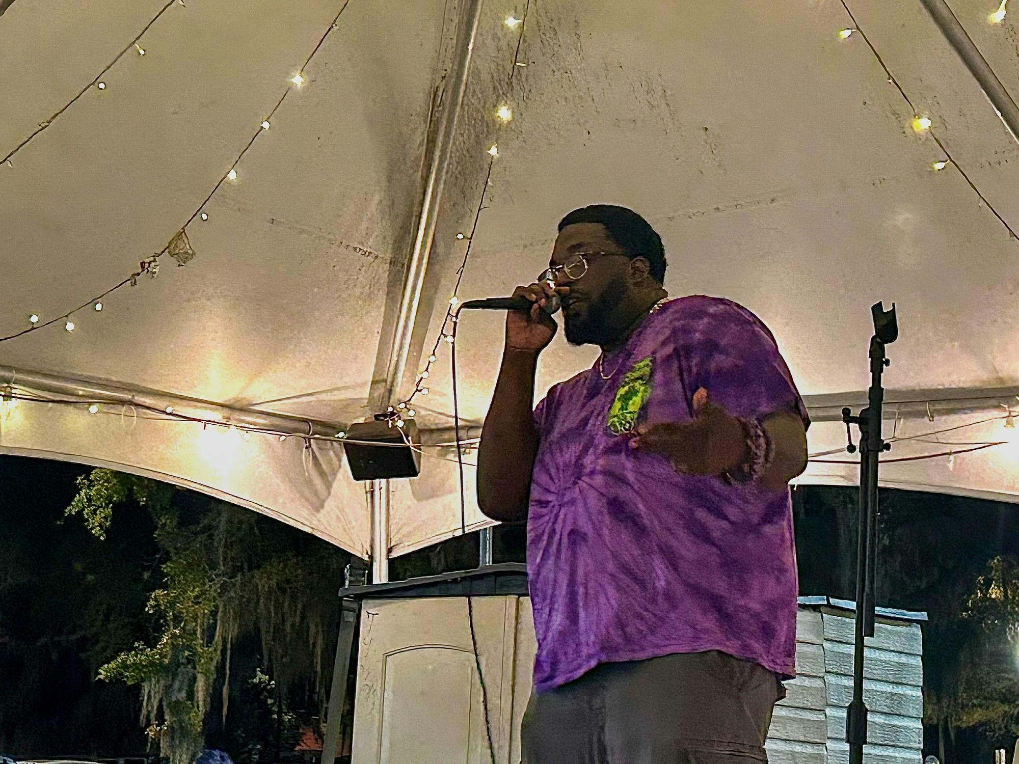Rayvon Rollins, otherwise known as Purple Kloud, performs outside The Bull at the Downtown Market Series on Friday, March 6, 2026, in Gainesville, Fla.