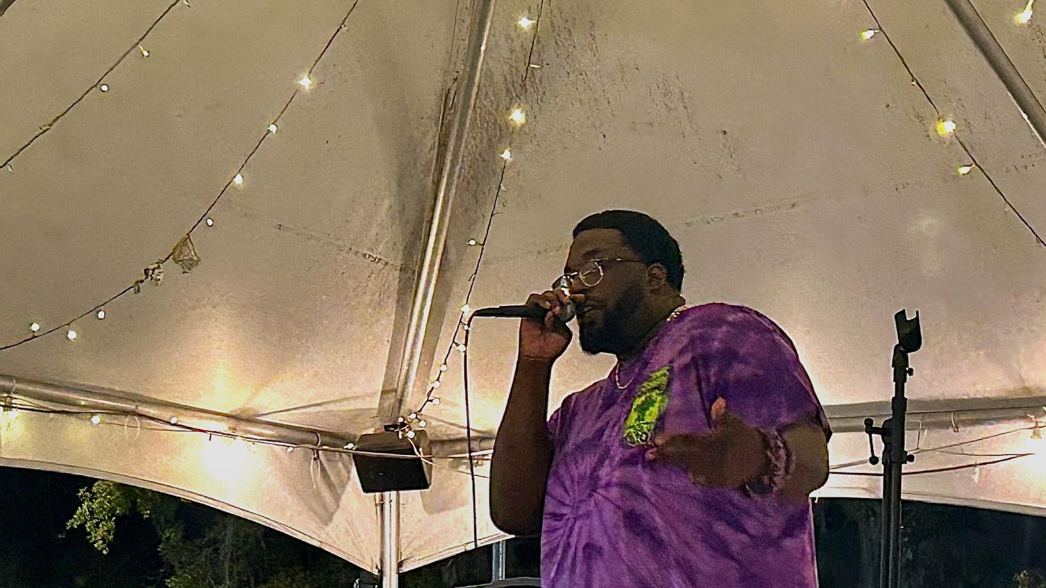 Rayvon Rollins, otherwise known as Purple Kloud, performs outside The Bull at the Downtown Market Series on Friday, March 6, 2026, in Gainesville, Fla.