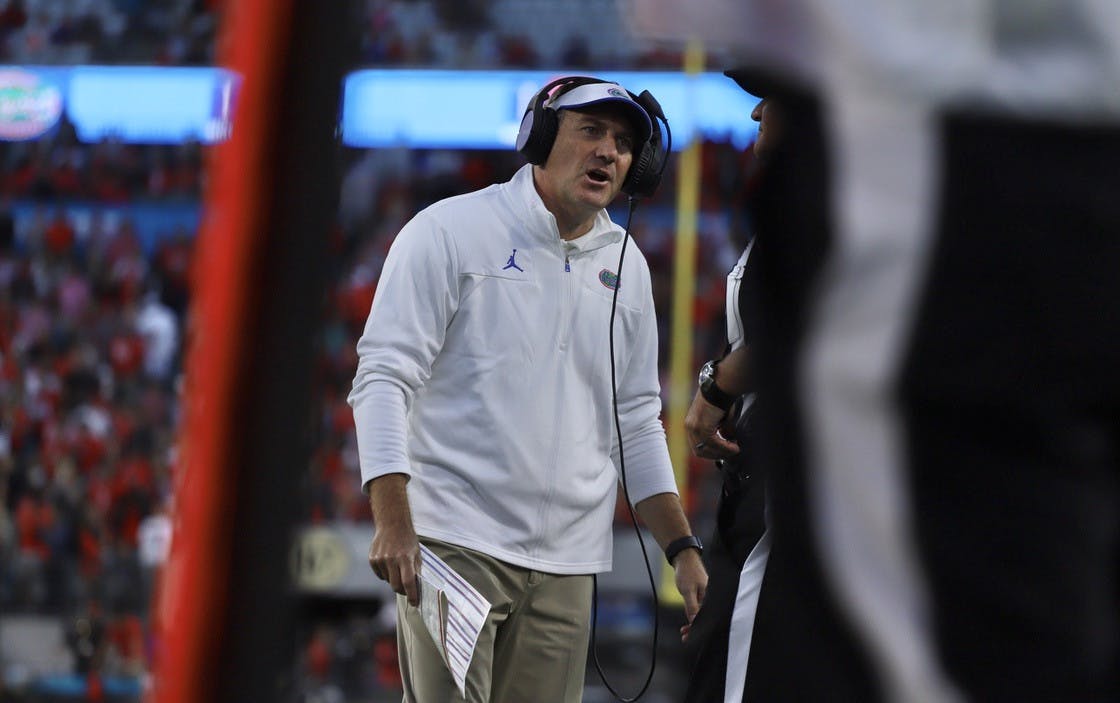 Gators head coach Dan Mullen glares at a ref during Florida's 34-7 loss to the Georgia Bulldogs on Oct. 30.