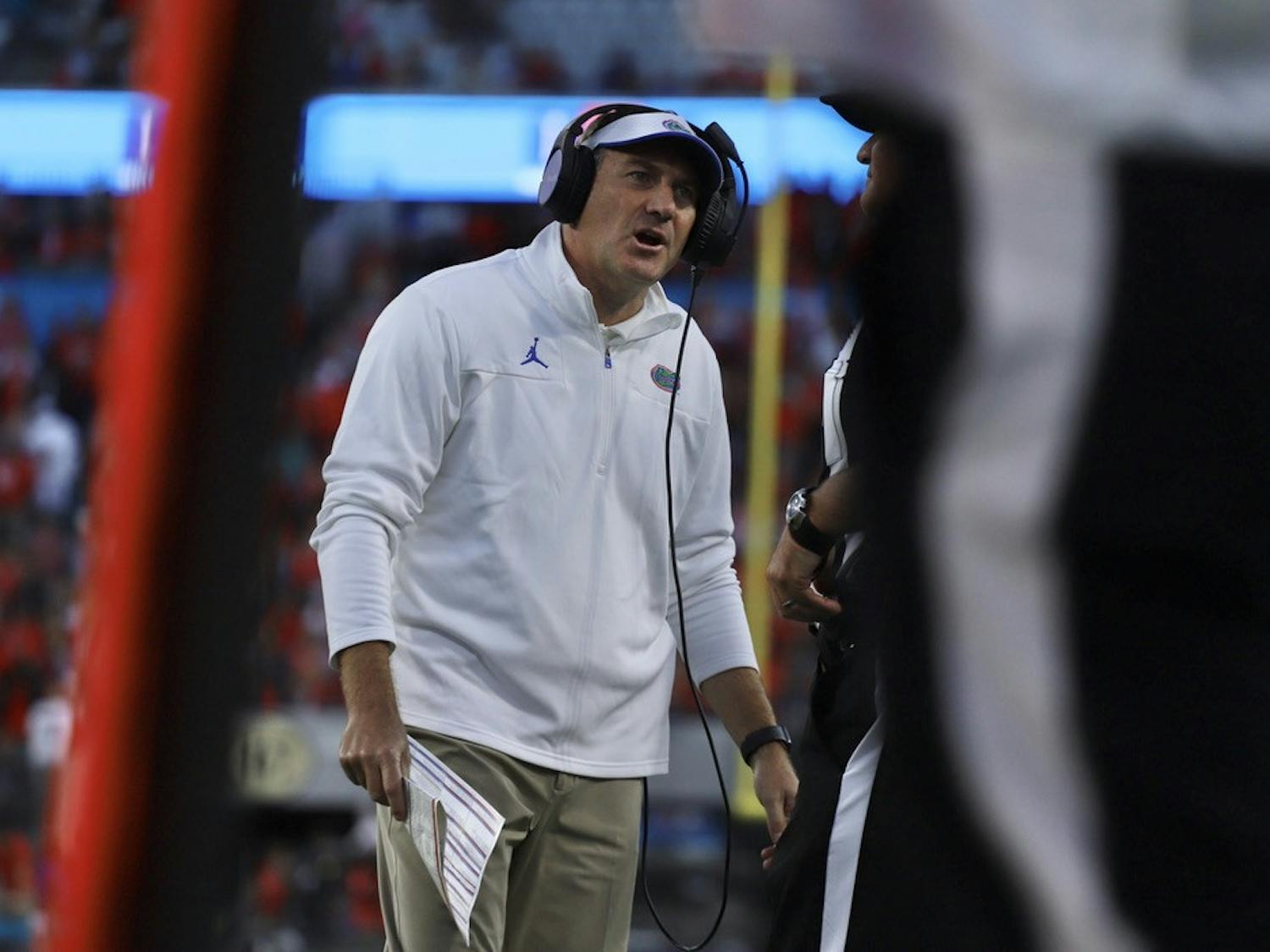 Gators head coach Dan Mullen glares at a ref during Florida's 34-7 loss to the Georgia Bulldogs on Oct. 30.