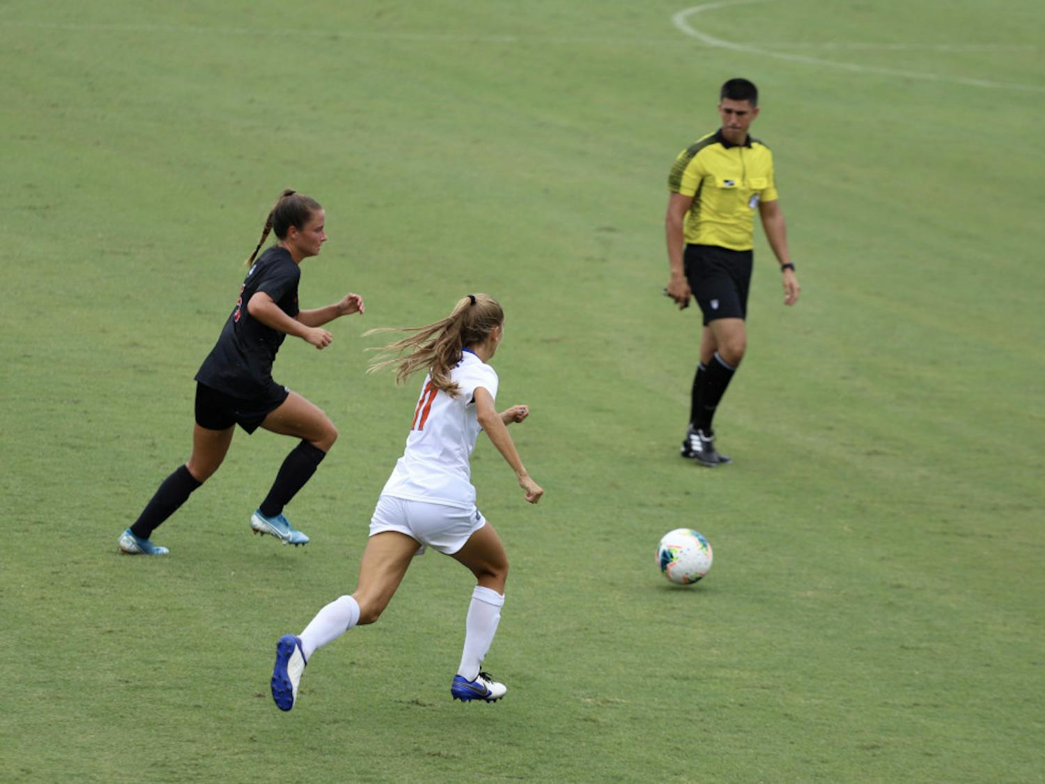 Redshirt freshman midfielder Nicole Vernis fights for a ball at Florida’s home opener against Georgia this season. Vernis scored her first collegiate goal versus South Carolina Sunday afternoon.