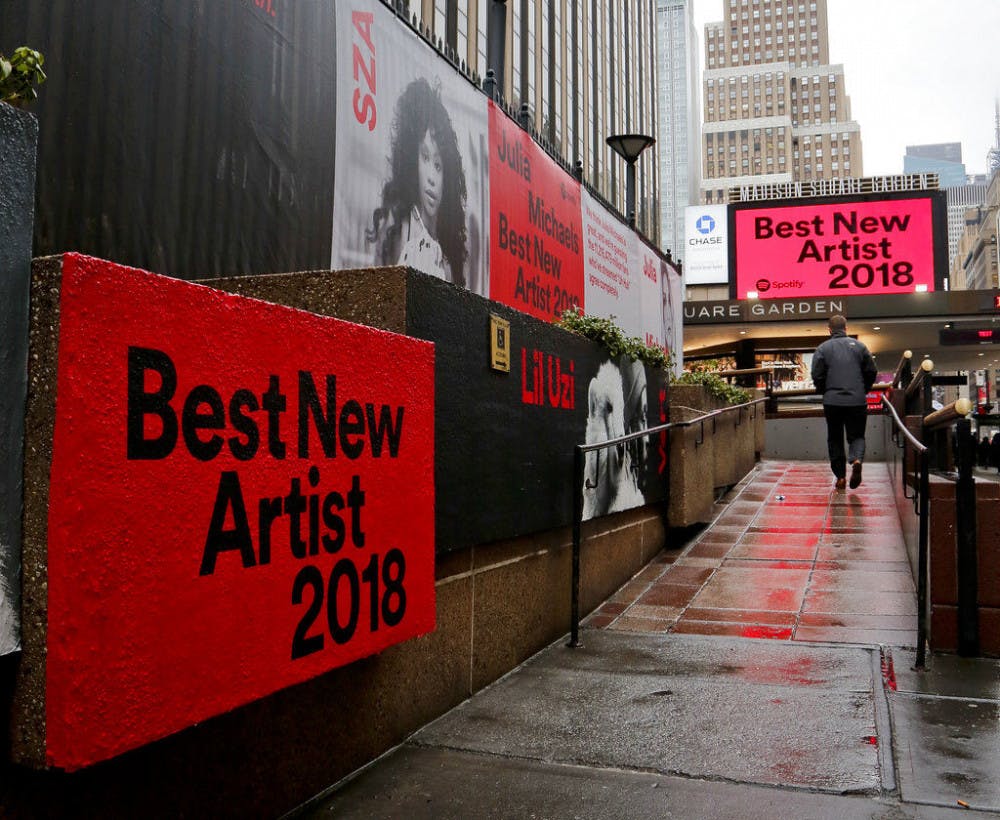 Signs posted around Madison Square Garden promote the return of the Grammy Awards to New York, Tuesday, Jan. 23, 2018, in New York. The Grammy Awards will be held on Sunday. (AP Photo/Bebeto Matthews)