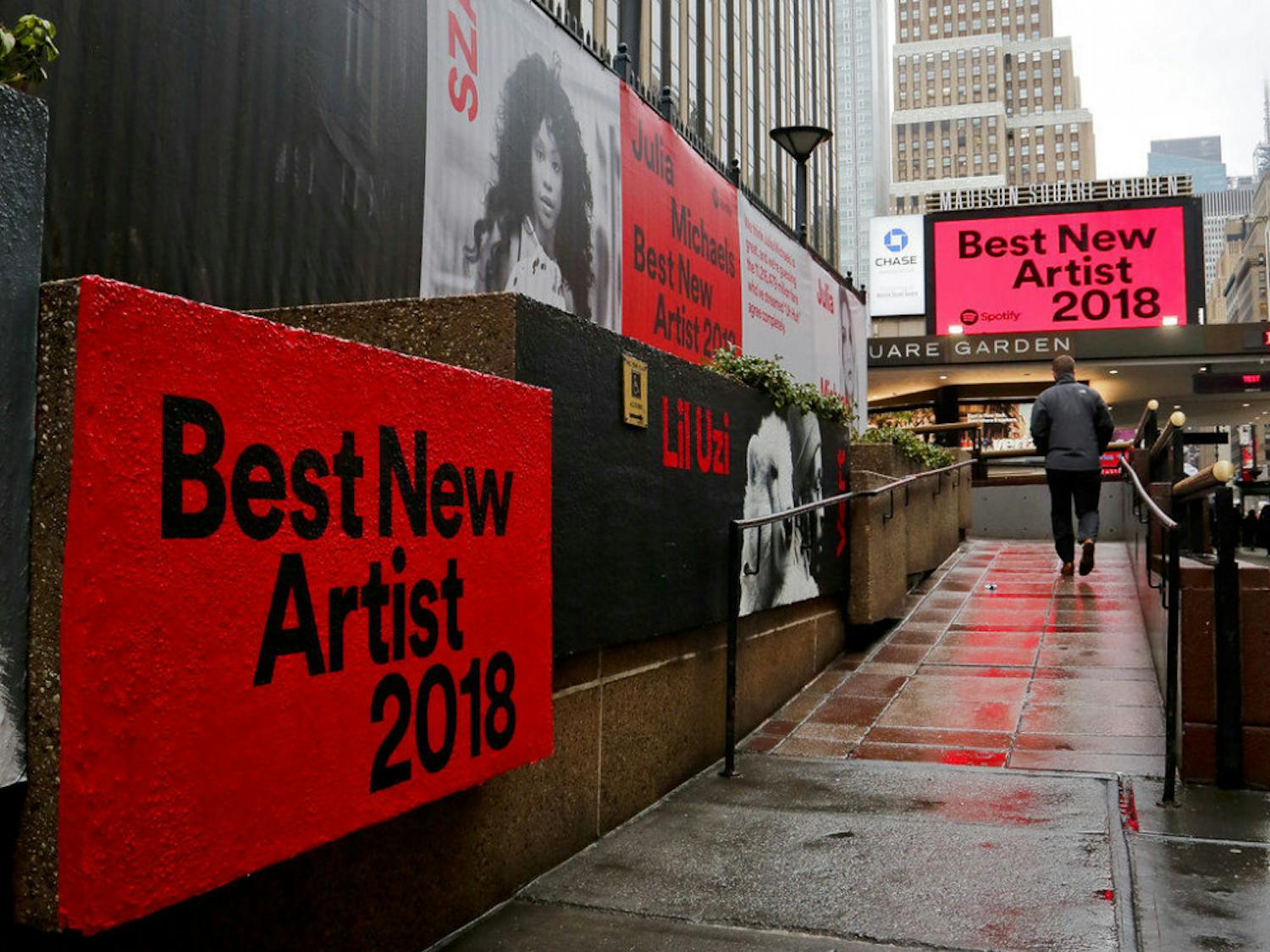 Signs posted around Madison Square Garden promote the return of the Grammy Awards to New York, Tuesday, Jan. 23, 2018, in New York. The Grammy Awards will be held on Sunday. (AP Photo/Bebeto Matthews)