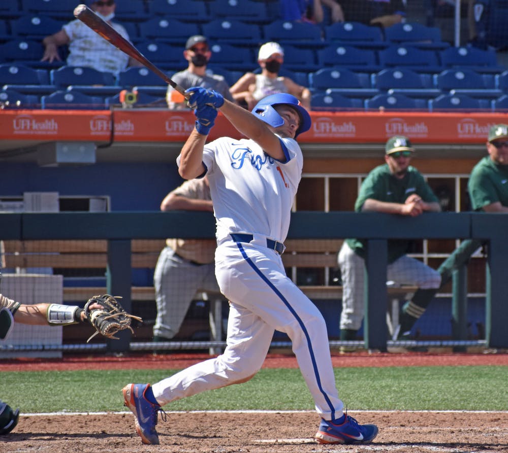 Nathan Hickey swings at a pitch against Jacksonville on March 14. Hickey knocked in a team-leading 45th RBI of 2021 on Tuesday night.