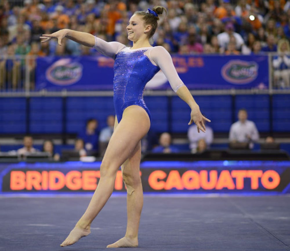 <p>Bridgette Caquatto performs a floor routine during Florida’s 197.075-196.225 win against Georgia on Jan. 24 in the O’Connell Center.</p>