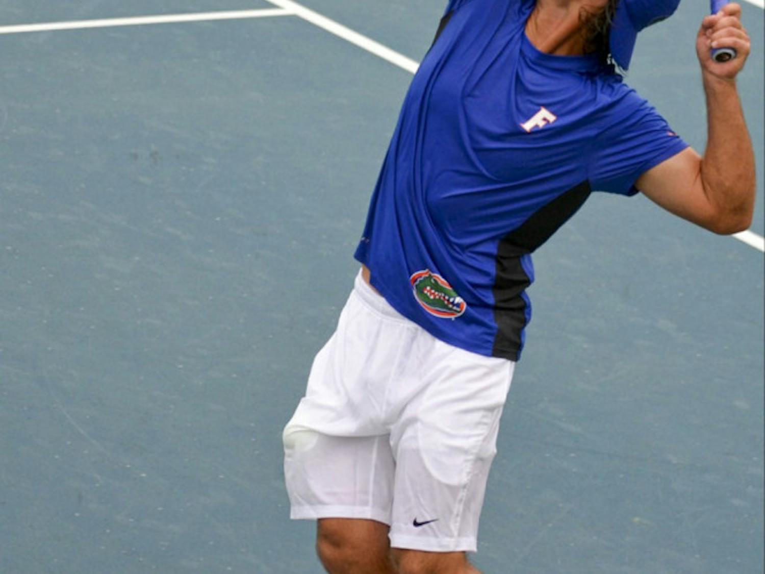 Diego Hidalgo prepares to serve during the SEC Fall Classic at UF's Ring Tennis Complex