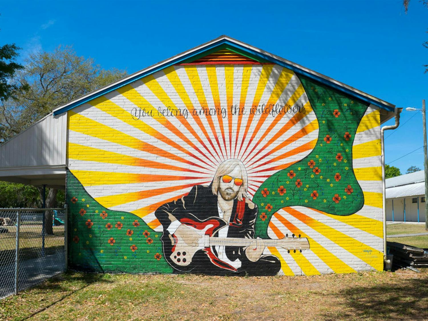 The owners of Visionary CrossFit, Carrie Martinez and Jesus Martinez, painted a Tom Petty tribute mural as a gift to Sidney Lanier Center.