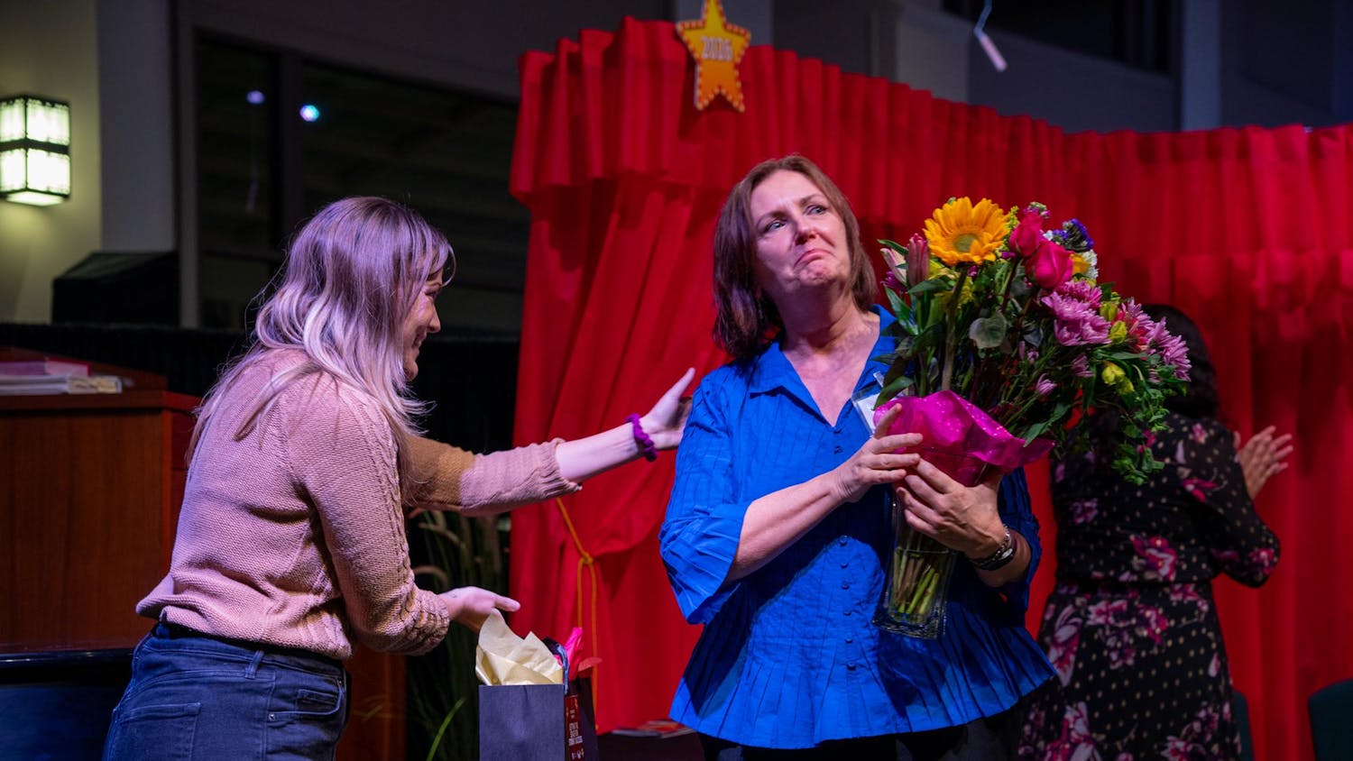Teacher of the year winner Barbra Brock accepts her award at Trinity United Methodist Church in Gainesville, Fla., Wednesday, Jan. 22, 2026.