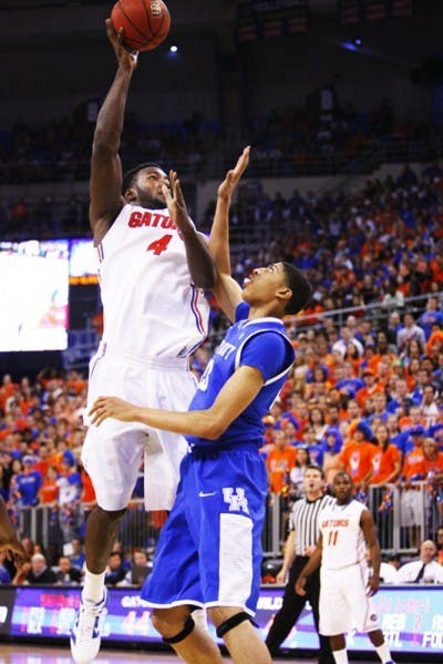 Florida junior Patric Young scored a team-high 21 points on 10-of-15 shooting and hauled in nine rebounds against Anthony Davis and Kentucky, but could not prevent the Wildcats from notching their 16th win in SEC play.
