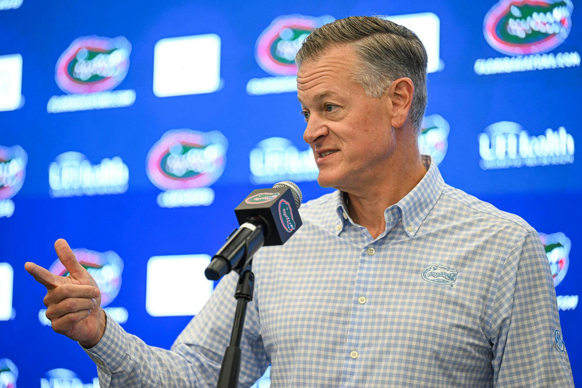 Florida Gators athletics director Scott Stricklin speaks before interim head coach Billy Gonzales at his opening press conference on Monday, Oct. 20, 2025, in Gainesville, Fla.