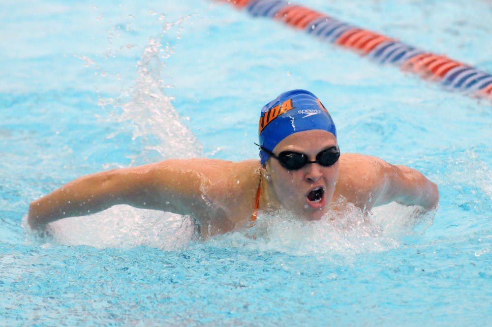 <p>Alyssa Yambor-Maul races in the 200 meter butterfly during Florida’s meet against Auburn on Jan. 23, 2016, in the O’Connell Center.</p>