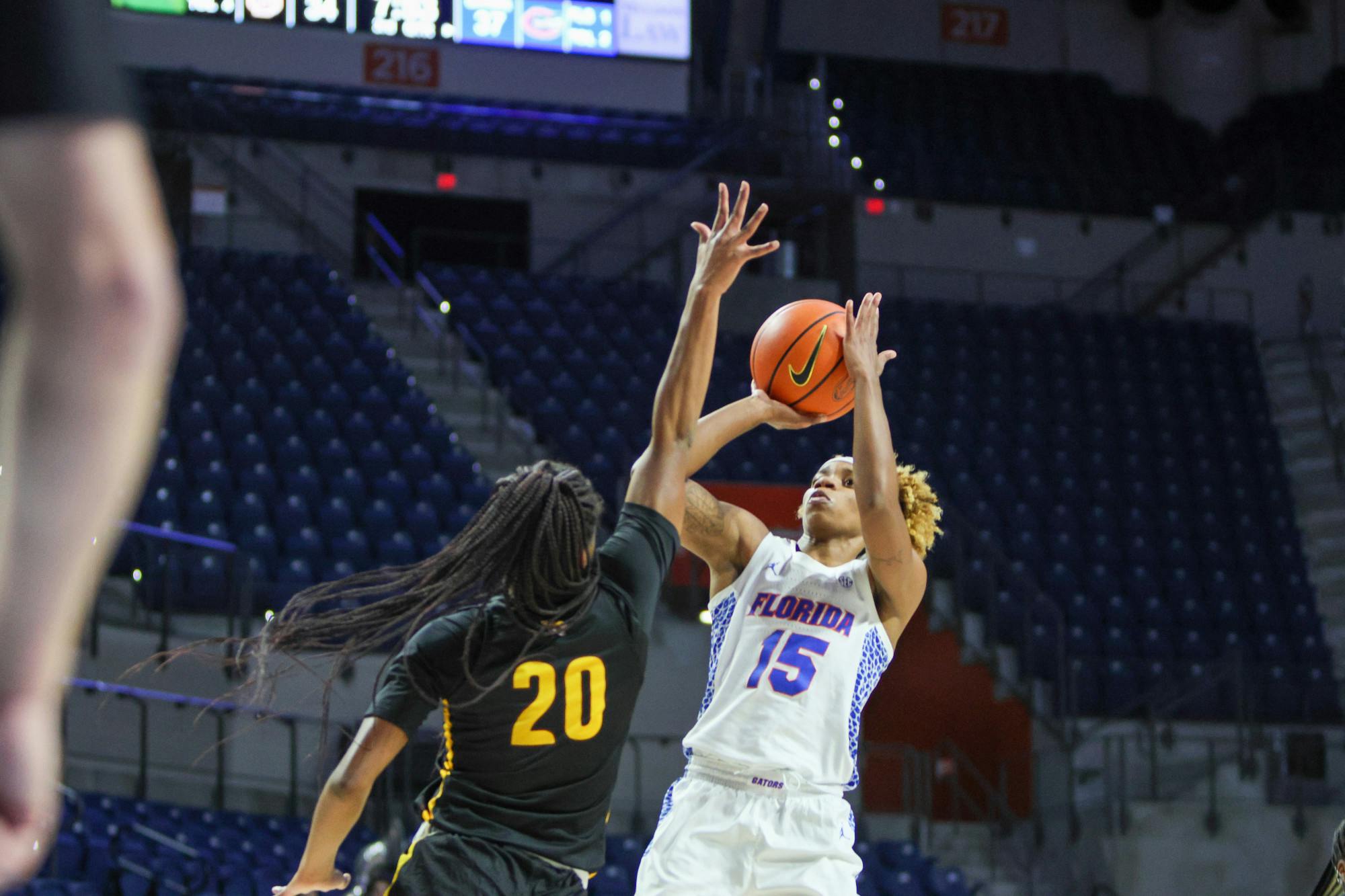 Florida senior guard Nina Rickards attempts a jump shot over the outstretched hand of a Bethune-Cookman defender Friday, Nov. 18, 2022. Rickards finished with 23 points in the Gators&#x27; victory over Miami Sunday, Dec. 11, 2022.