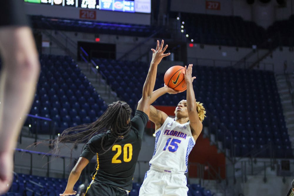 <p>Florida senior guard Nina Rickards attempts a jump shot over the outstretched hand of a Bethune-Cookman defender Friday, Nov. 18, 2022. Rickards finished with 23 points in the Gators&#x27; victory over Miami Sunday, Dec. 11, 2022.</p>