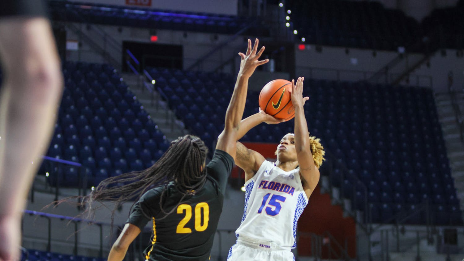 Florida senior guard Nina Rickards attempts a jump shot over the outstretched hand of a Bethune-Cookman defender Friday, Nov. 18, 2022. Rickards finished with 23 points in the Gators&#x27; victory over Miami Sunday, Dec. 11, 2022.