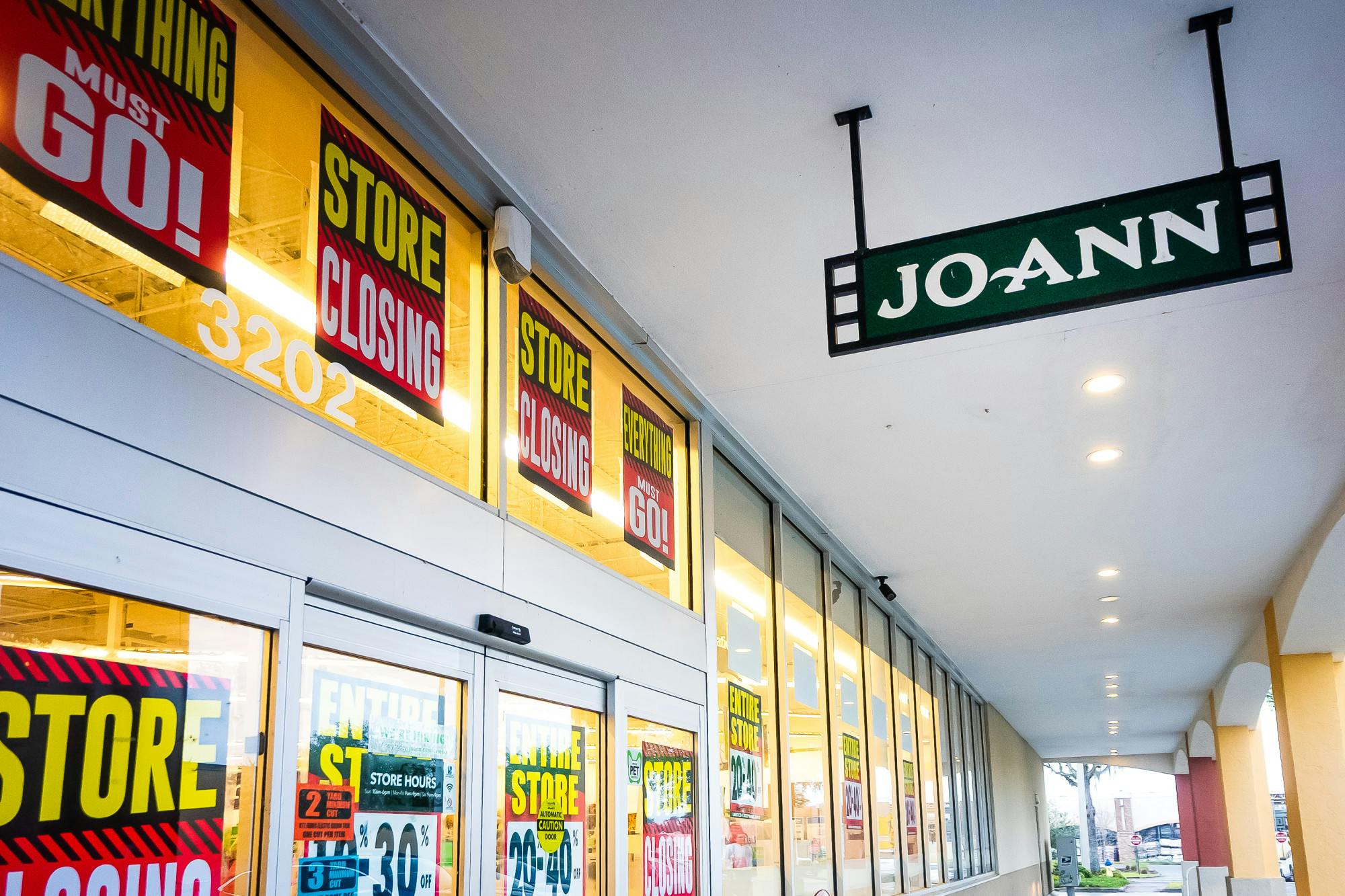 Signs announcing the store&#x27;s closure and discounts are displayed at the entrance of the JOANN Fabric and Craft store on Archer Road on Saturday, March 8, 2025, in Gainesville, Fla.