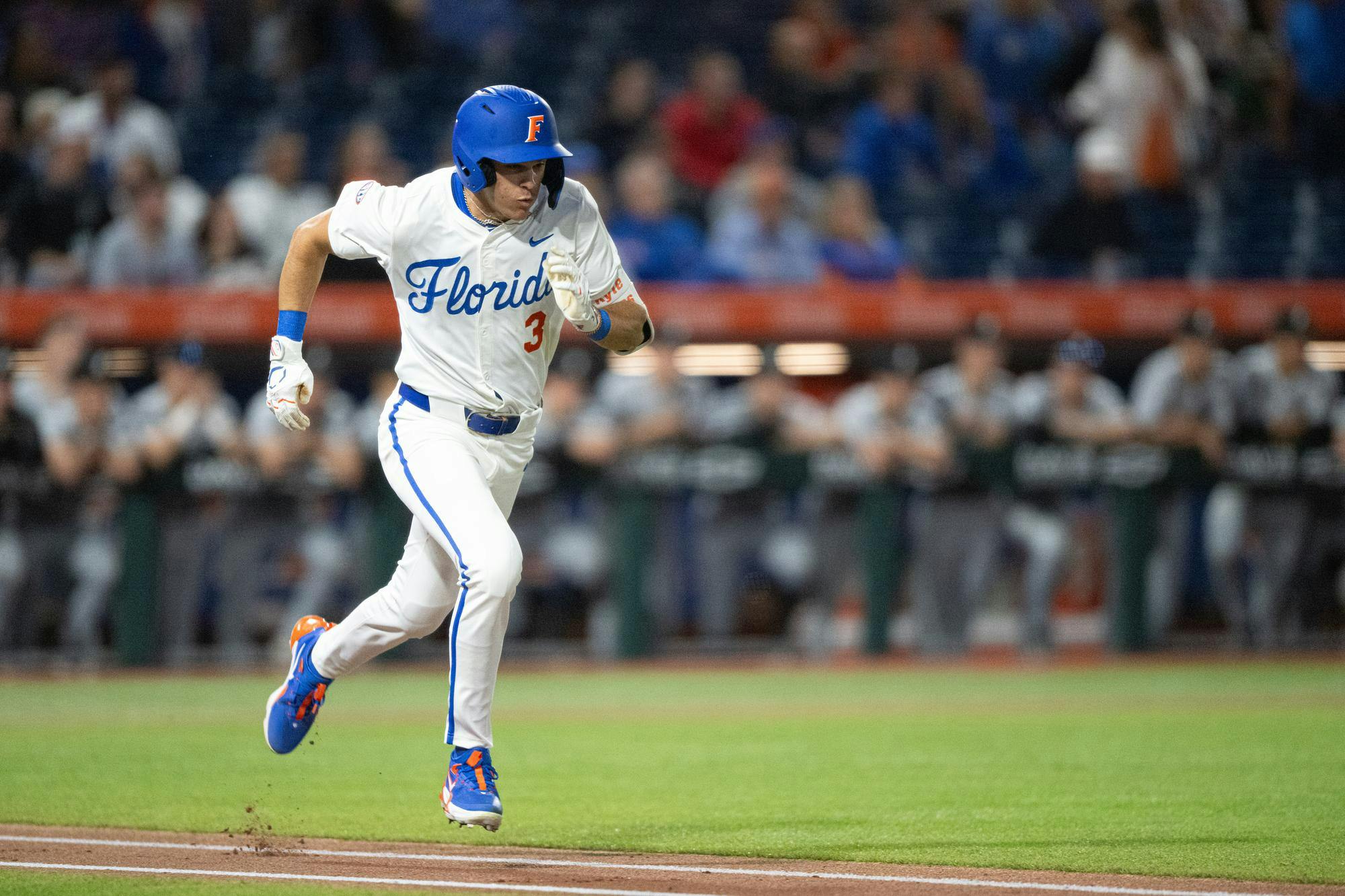 Florida Gators outfielder Kyle Jones (3) sprints to first base in a baseball game against the Air Force Academy in Gainesville, Fla., on Friday, Feb. 14, 2025.