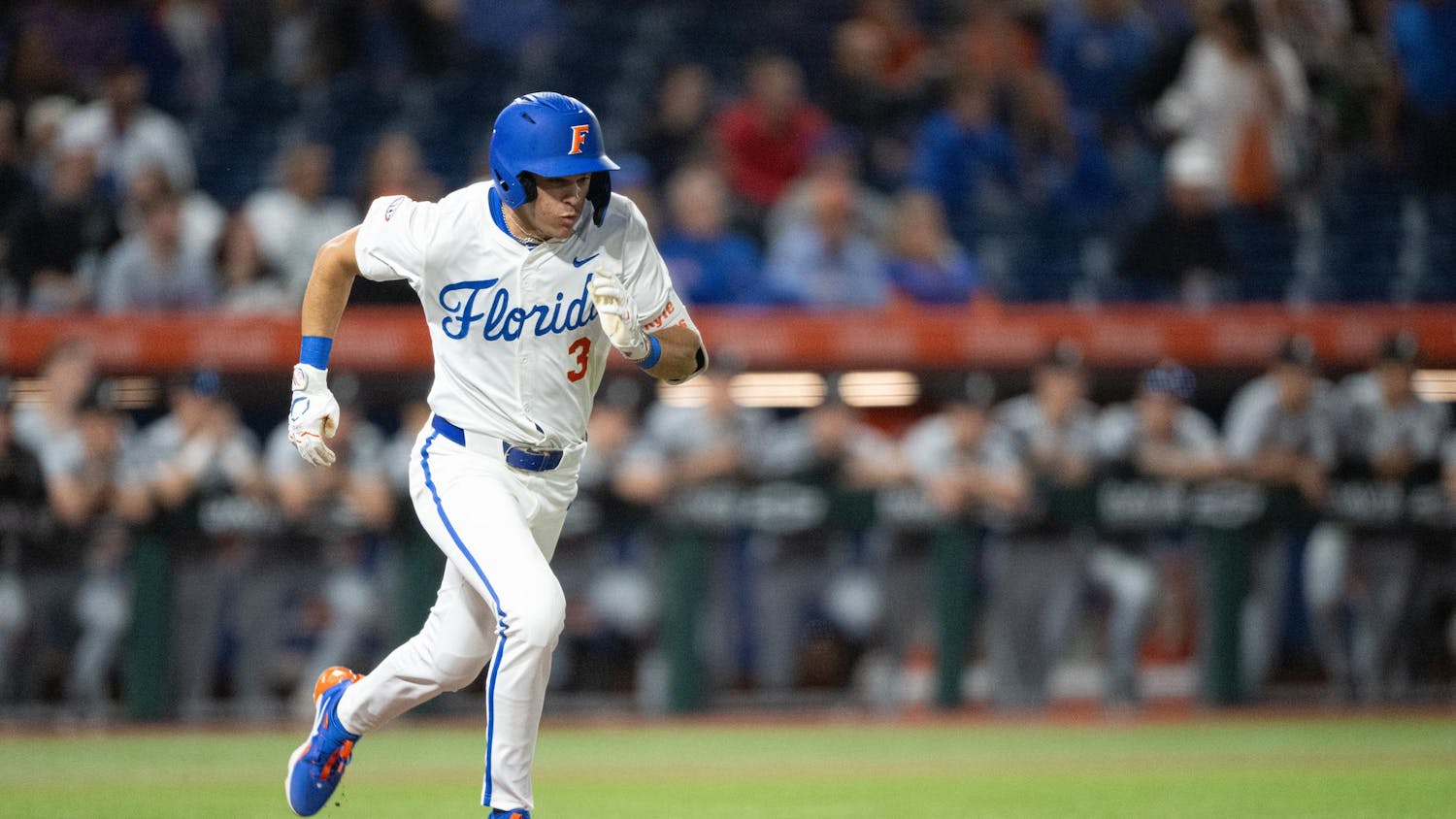 Florida Gators outfielder Kyle Jones (3) sprints to first base in a baseball game against the Air Force Academy in Gainesville, Fla., on Friday, Feb. 14, 2025.