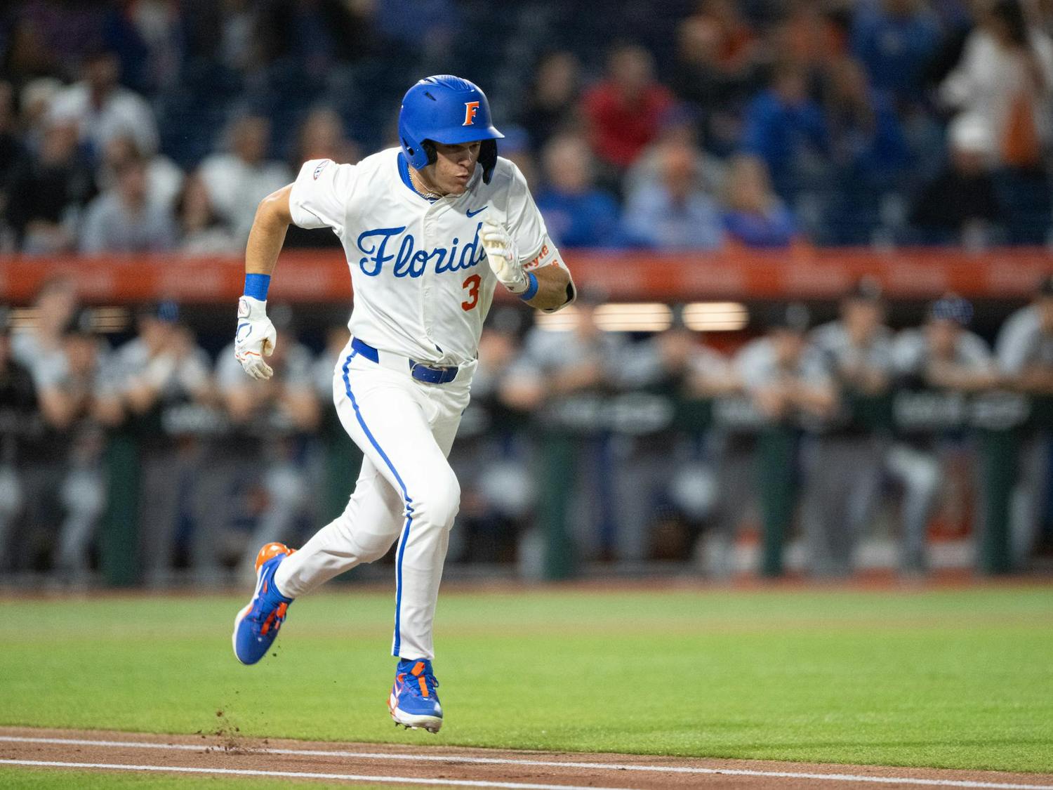 Florida Gators outfielder Kyle Jones (3) sprints to first base in a baseball game against the Air Force Academy in Gainesville, Fla., on Friday, Feb. 14, 2025.