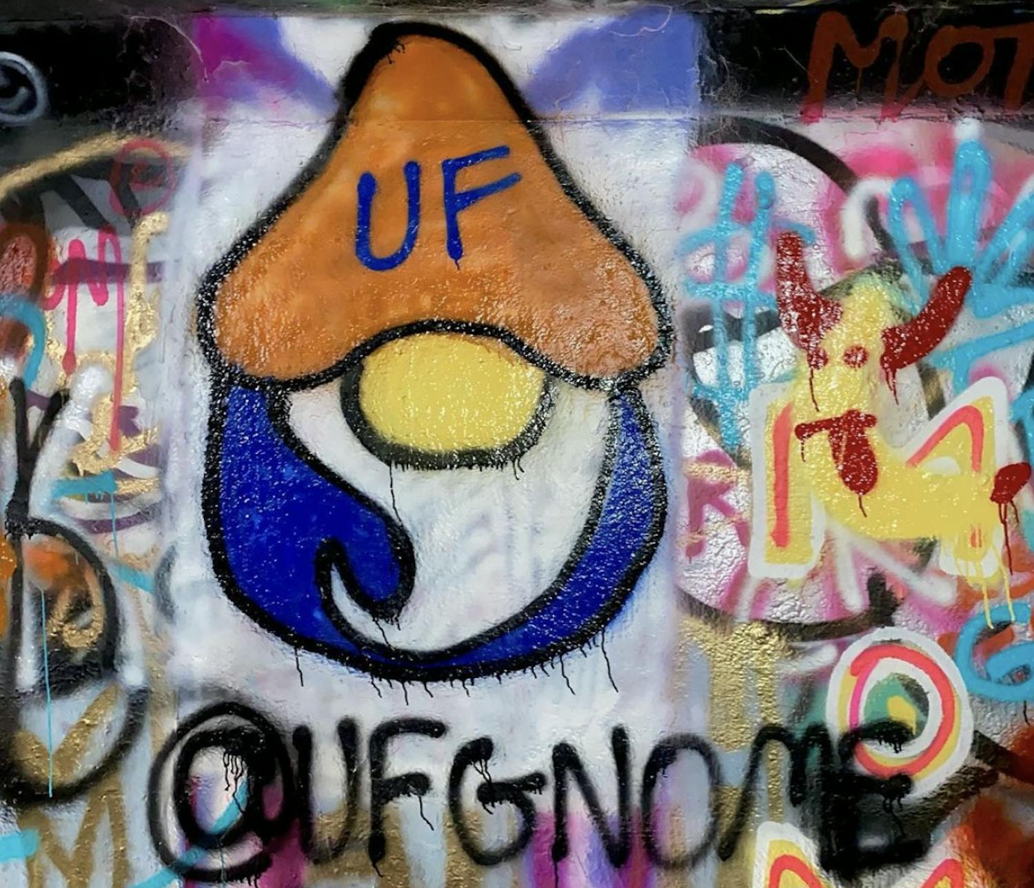 Graffiti of the UF gnome painted in August inside the tunnel near Norman Hall.