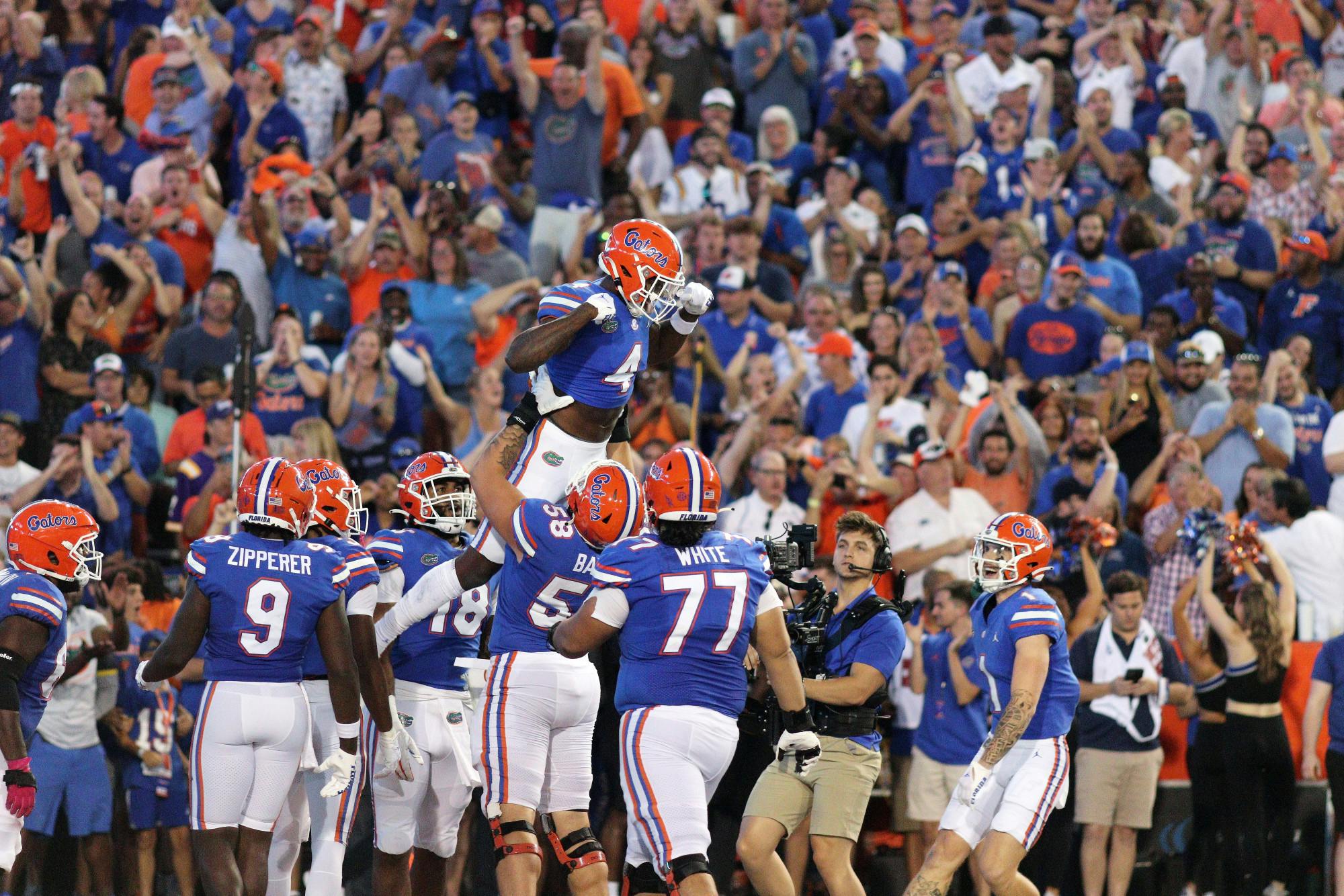 UF wide receiver Justin ﻿Shorter celebrates a touchdown with his teammates during the Gators&#x27; matchup with the LSU Tigers Saturday, Oct. 15, 2022. 