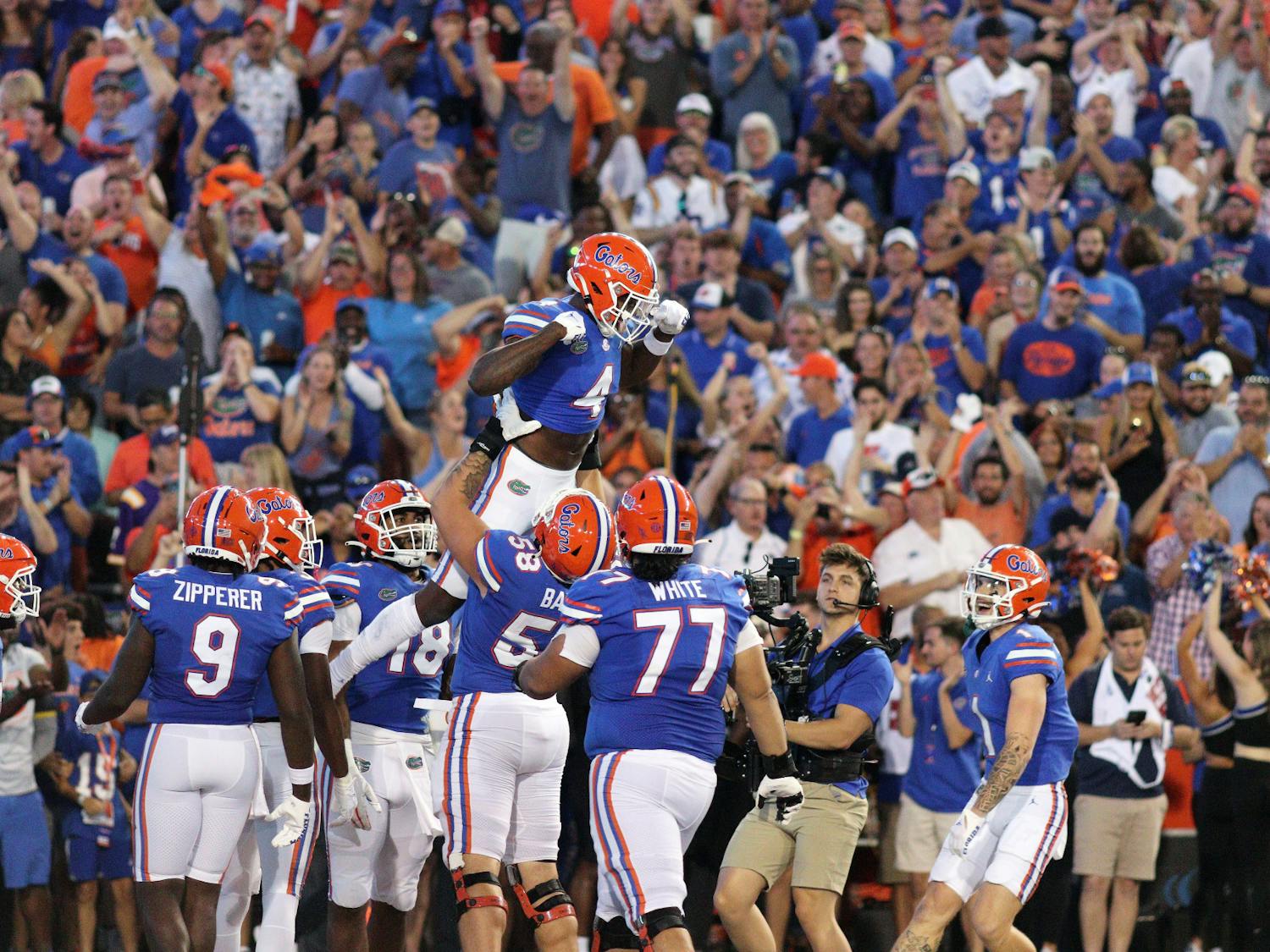 UF wide receiver Justin ﻿Shorter celebrates a touchdown with his teammates during the Gators&#x27; matchup with the LSU Tigers Saturday, Oct. 15, 2022. 