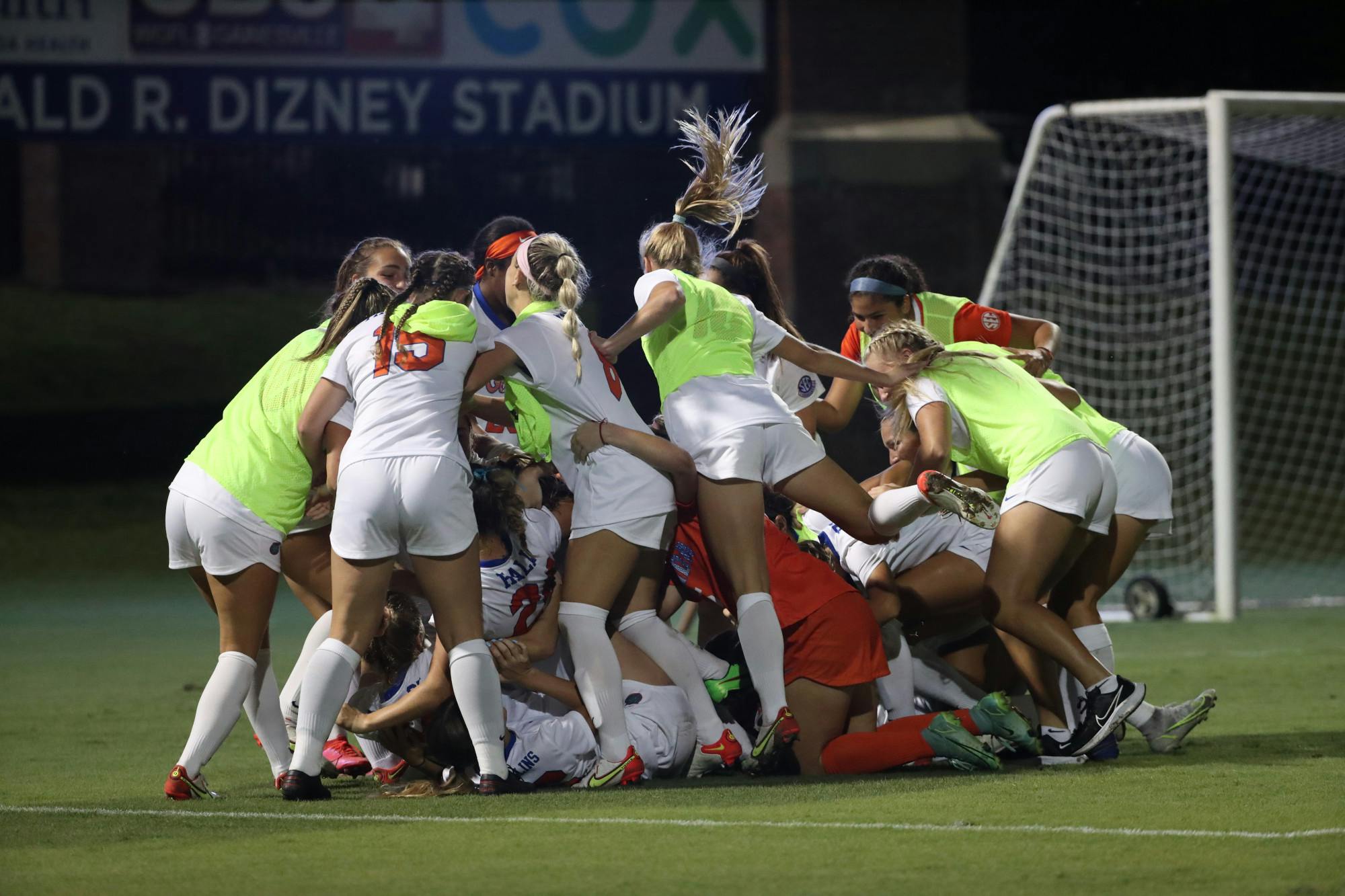 Florida soccer jumps on Julianne Leskauskas in celebration of its win over Kentucky Sept. 23, 2021. The Gators announced the hiring of new head coach Samantha Bohon Monday.