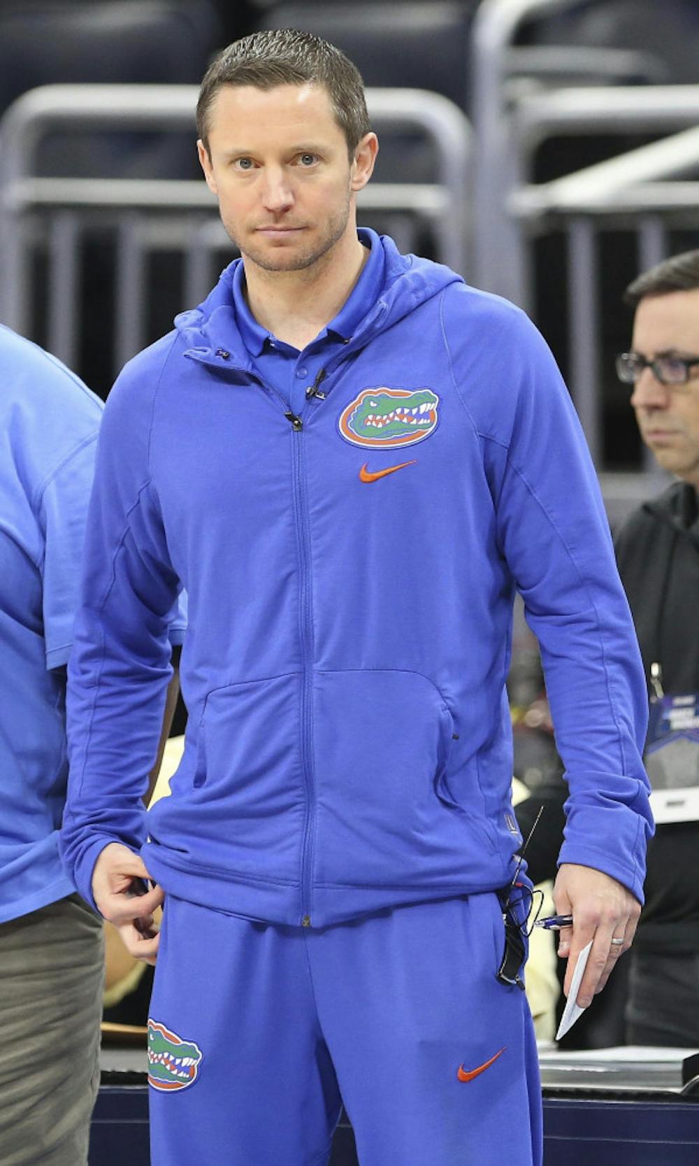 <p>Florida head coach Mike White looks on during a practice session for the NCAA March Madness Tournament at the Amway Center in Orlando, Fla. on Wednesday, March 15, 2017. (Stephen M. Dowell/Orlando Sentinel via AP)</p>
