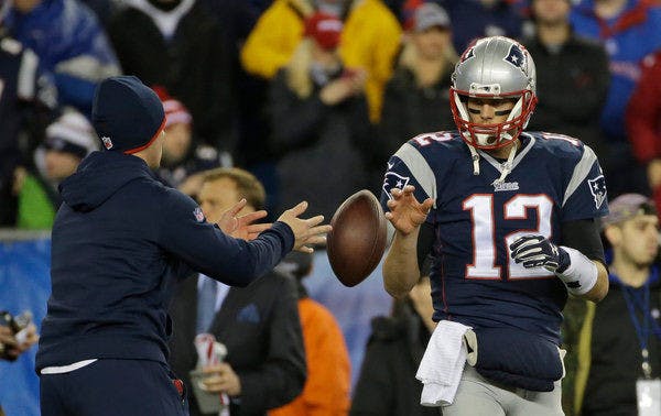 New England Patriots quarterback Tom Brady has a ball tossed to him during warmups before the NFL football AFC Championship game against the Indianapolis Colts on Jan. 18, 2015 (Photo credit&nbsp;Matt Slocum/Associated Press).