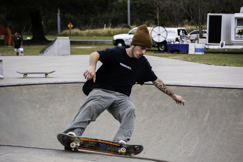 Sly Sullivan, a 22-year-old local skater, practices for the Possum Creek Skate Park Jam on Saturday.