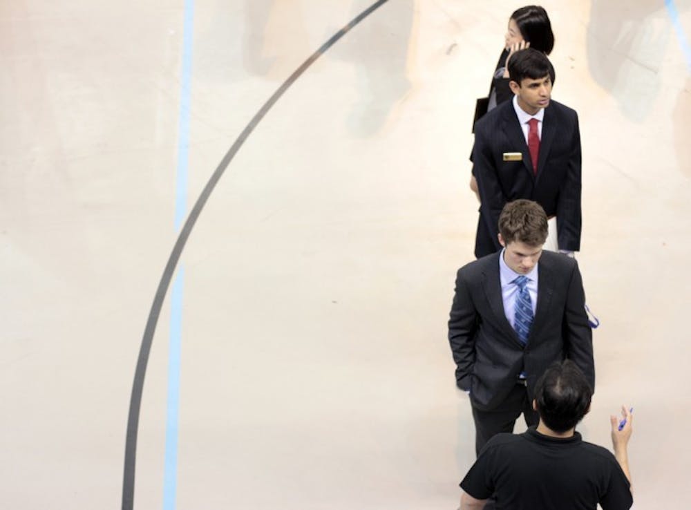 <p>Students wait in line to talk to a representative from Ryder Logistics and Transportation Solutions Worldwide at the Career Showcase in the O'Connell Center on Tuesday afternoon.</p>