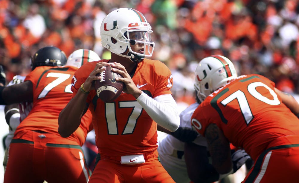 Miami quarterback Stephen Morris (17) passes for a first down during his team's 24-21 win against Wake Forest in Miami Gardens on Oct. 26.
